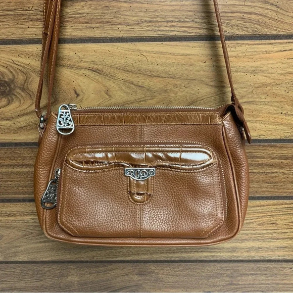 Brighton tan purse with blue patterned interior.  Built in wallet - Picture 3 of 10
